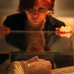 National Museum of Scotland staff member Henrietta Lidchi with one of the new Egyptian mummies on display in Edinburgh. Image: David Cheskin/PA Wire