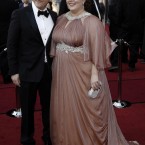 Bridesmaids' Melissa McCarthy in custom Marina Rinaldi, who must have been busy pre-Oscars. 

Image: AP Photo/Matt Sayles