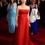 Natalie Portman glams up a vintage Dio rred and black polka-dot gown with Harry Winston diamonds. 