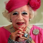 The late queen of romantic fiction Dame Barbara Cartland in her distinctive pink outfit. Image: Williams Justin Williams/PA Images