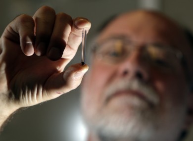 A US research holds a vial with a fragment of rock from Apollo 11. Ireland's fragment of Apollo 11 rock has been missing since a fire in 1977.