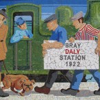 Newly refurbished mosaic at Bray Dart station shows uniformed 'Black andTan' figure with dog with Union Jack collar. (Via mural-to-mosaic.blogspot.com)