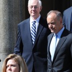 Former New York Comptroller Alan Hevesi, center, exits Manhattan criminal court following his arraignment in New York. Hevesi pleaded guilty to a felony following probe into corruption of the state's pension fund. (AP Photo/ Louis Lanzano)
