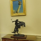 A tabletop bronze sculpture by Frederic Remington, 