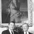 President Jimmy Carter and President-elect Ronald Reagan in the Oval Office of the White House in Washington in 1980. The painting behind them is of George Washington as a young officer. (AP Photo)