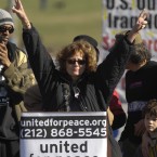 Actress Susan Sarandon gives the peace sign during a rally opposing the war in Iraq on the National Mall in 2007. (Kevin Wolf/AP Photo)<span class=