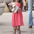 Young fashionista, Suri Cruise, who reportedly has a rather expensive purse for her age. (Cau-Guerin/ABACA USA/Empics Entertainment)