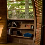Interior storage space built into the treehouse. (Image via Joel Allen)