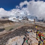 The mountain is glimpsed through cloudcover - the central peak in this photo. (Image via AirPano.com)