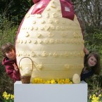 Not a fan of chocolate? Then you would have loved this cheese egg. Pictured are 13-year-old Rudi Jurkschat (left) and his 11-year-old sister Natasha next to a giant Cathedral City 'Cheester Chegg', as Cathedral City announced a campaign to get 'Cheester Cheggs' (cheese Easter eggs) in store for Easter 2011.
(Geoff Caddick/PA Wire)