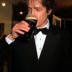 Back at home in Blighty, Hugh Grant would have been having a pint of beer/ale. Here, in Dublin in 1995, he was having a gargle. Slightly bizarre choice of synonym for it as alcohol is never knowingly gargled in Ireland, and much more likely to be swallowed. (Pic: Eamonn Farrell/Photocall Ireland)