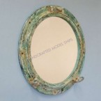 Ever wondered what it would be like if you could see your own image through the Titanic wreck's portholes? Yours for $199.99 on handcraftednauticaldecor.com.