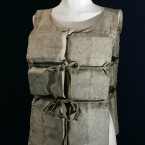 A Titanic life-preserver, belong to a survivor, which was auctioned at Christie's Maritime sale in 2007. The century-old canvas jacket, lined with buoyant cork, belonged to Mabel Francatelli, one of 12 passengers to escape from the RMS Titanic in a lifeboat built to fit 40, the London-based auction house said. Her vest - carrying her faded signature and those of seven other survivors - was offered for sale along with a letter she wrote describing what happened that night. (AP Photo/Sang Tan)
