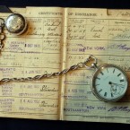 A mariner's certificate of discharge from the White Star Liner RMS Titanic which sunk in 1912 and a silver chain watch at Bonhams auction house. The items will go under the hammer later this month. (Michael Stephens/PA Images)