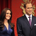 The new wax figures of the Duke and Duchess of Cambridge go on display at Madame Tussauds in London. (John Stillwell/AP Images)