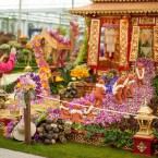 A visitor photographs a display in the Great Pavilion. (Dominic Lipinski/PA Wire)