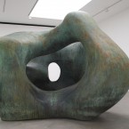 Gallery visitor Phoebe Moore looks at artist Henry Moore's Large Two Forms (1966). (Max Nash/PA Wire)