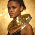 Model Portia Okocha wears a gold necklace designed by goldsmiths Wright & Teague, commissioned to appear at the Goldsmiths' Company exhibition, Gold: Power and Allure. (Dominic Lipinski/PA Wire)