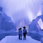 Children stand in a multimedia installation about global warming's effect on glaciers at the Green Nation Fest environmental show in Rio de Janeiro, Brazil. (AP Photo/Victor R. Caivano)