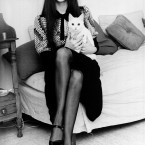 Victoria Principal - later known to us all as Pamela in Dallas - with her cat Motza at her Chelsea flat in London in 1970 when she was just 20. (AP Photo/Press Association Images)