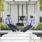 Gardaí Barry Heffernan and Pauline Firth take a seat in the garden 'Amach Agus Isteach' designed by Alan Rudden and David Ryan. (Photo: Laura Hutton/Photocall Ireland)
