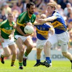 Kerry's Paul Galvin and Tipperary's Brian Fox in a face-off at the Munster GAA Football Senior Championship Quarter-Final in Semple Stadium in Thurles, Co Tipperary. Image: INPHO/James Crombie.