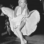 Marilyn Monroe poses over the updraft of a New York subway grating while in character for the filming of 