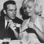 Actress Marilyn Monroe rolls up some pasta in a restaurant in San Fransico during a dinner with actor Montgomery Clift in 1960. (AP Photo)