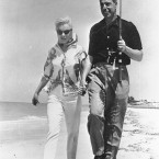 Actress Marilyn Monroe and ex-husband, former New York Yankees ball player Joe DiMaggio, walk the shores of a beach near Sarasota in 1961. (AP Photo)