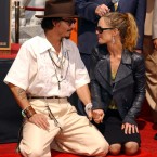 Johnny Depp honored with Hand & Footprint Ceremony at Grauman's Chinese Theatre in Hollywood, accompanied by Vanessa Paradis in September 2005. (Tammie Arroyo/UK Press/Press Association Images) 