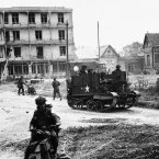 After landing on the French coast, Allied troops push further inland. Passing through French villages, they were given a warm welcome by the inhabitants. (AP Photo)