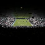 A first-round match at Wimbledon between Tamira Paszek of Austria and Caroline Wozniacki of Denmark. (AP Photo/Sang Tan)