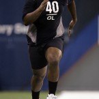 During his childhood and teenaged years, Oher was living on the streets while his crack-addicted mother lived in public housing.   He was eventually taken in to live with a wealthy family, played college football at the University of Mississippi and drafted into the NFL in 2009 for the Baltimore Ravens.   His inspirational story was turned into Michael Lewis's 2006 book 