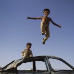 Two Afghan boys play in Kabul. (AP Photo/Ahmad Jamshid)
