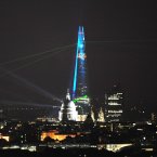The laser show projected from The Shard skyscraper on the South Bank, London, as seen from Parliament Hill. (John Phillips/UK Press/Press Association Images)