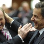 Enda Kenny and Nicolas Sarkozy playfully bopping each other on the head and arm to show that a financial crisis is no reason to fall out. (AP Photo/Geert Vanden Wijngaert/PA)