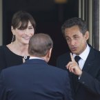 Nicolas Sarkozy laying down the house rules to Silvio Berlusconi before dinner at the G8 summit in France last year. (Chris Ratcliffe/PA Wire)