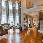 We think that's a TV secreted inside the wooden structure on the right. (Estate agent: sothebysrealty.ca)