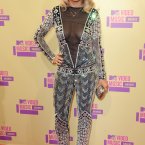 Several puppies and small children were blinded by Rita Ora's low cut catsuit (Image: Doug Peters/EMPICS Entertainment)