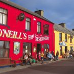 Brightly-painted shop and pub fronts in the West Cork village of Allihies. Image: Holger Leue/Tourism Ireland.