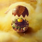 Nest of spinach, small burger, egg yolk -