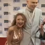 The Smashing Pumpkins frontman had a liaison with the girl who  had her own MTV series to find love.  It didn't last.  (See also:  Billy Corgan and Jessica Simpson.)  YouTube/RealityChatTV