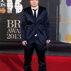 Poor Ed Sheeran, he's just never really going to look tidy, is he? Good thing he can write songs that make people weep. Joel Ryan/Invision/AP