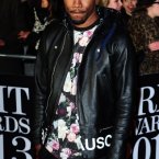 Frank Ocean showing that a little floral goes a long way. Looking good Mr. Ocean. Ian West/PA Wire/Press Association Images