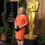 Jacki Weaver looked resplendent in orange. (Chris Pizzello/Invision/AP)