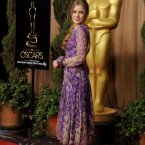 At last! Some colour from Amy Adams. We like this swishy frock. (Chris Pizzello/Invision/AP)