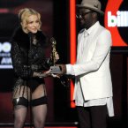 Will.i.am wasn't too sure about the ensemble.
Chris Pizzello/Invision/AP