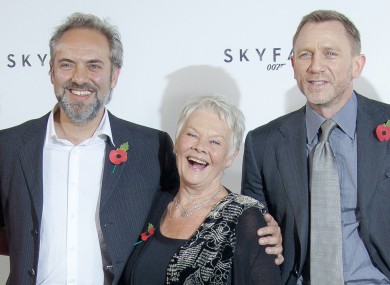 Sam Mendes, right, with Judi Dench and Daniel Craig. 