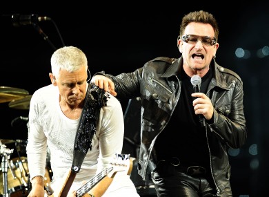 Adam and Bono, rocking out together in the past.