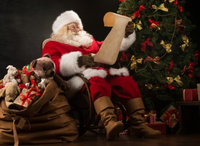 Santa peruses an extensive list from Ireland.
